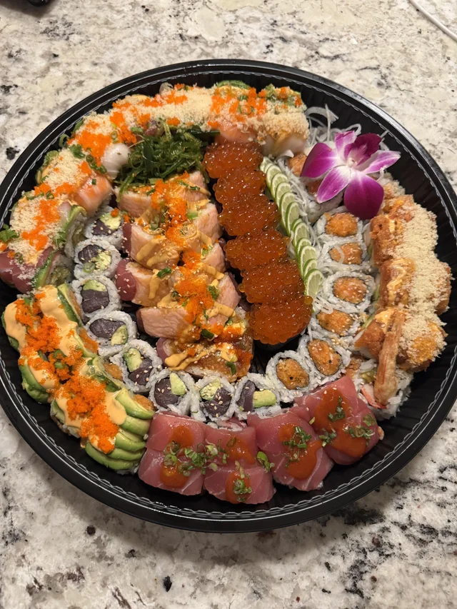 insane-super-bowl-sushi-tray-v0-m8h93kt71dig1.webp